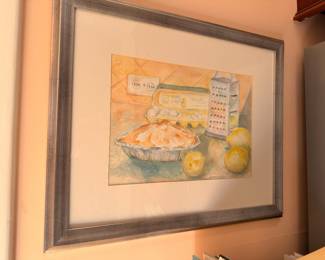 Framed watercolor still life with pie and lemons