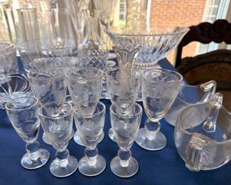 Etched crystal cordial glasses and cut glass bowls