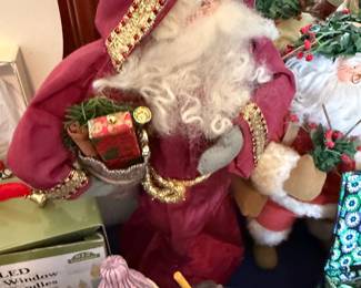 Hand-carved and painted Santa figurines