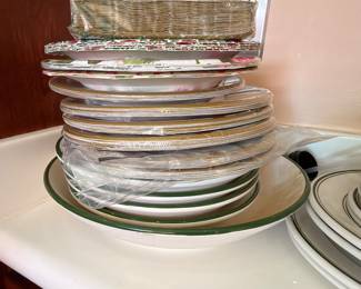 Stacked dinner plates and serving dishes