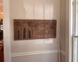 Large carved wood relief wall panel, village scene