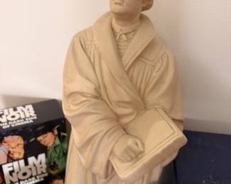 Chalkware seated figure sculpture