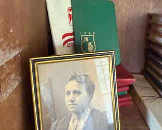 Antique framed portrait photograph and yearbooks