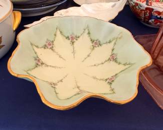 Hand-painted porcelain leaf dish with floral border