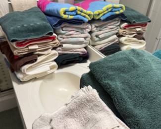 Folded towels and bath linens