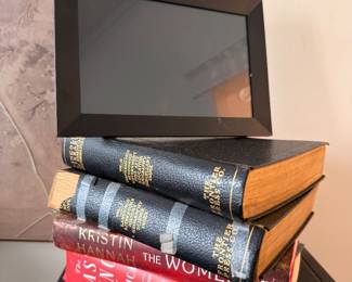 Antique leather-bound books with gilt spines