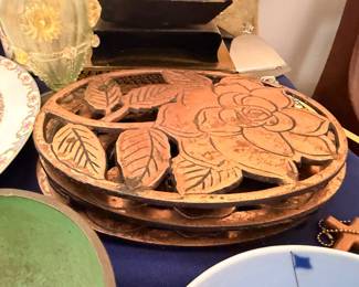 Carved wood magnolia trivets and plaques