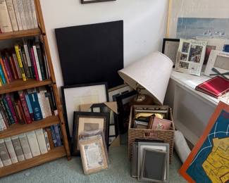 Bookshelves, framed art and table lamps