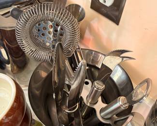 Bar tools, strainers and kitchen utensils
