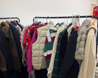 Rack of women's blouses and dresses