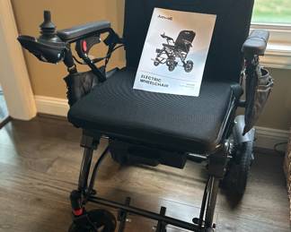 JusYell electric power wheelchair, a lightweight/folding style with joystick control,