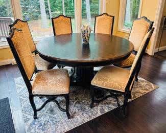 Beautiful round wood table with 6 chairs