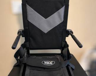 VOCIC patient transfer/lift chair. It’s designed to assist with transferring a person between a bed, chair, wheelchair, or toilet