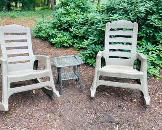 Three plastic rocking chairs