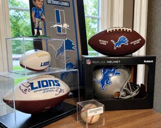 Detroit Lions items: helmet, football, wall art