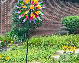 Beautiful metal lawn decor, large spinning wheel