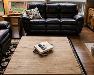 Leather electric reclining sofa and loveseat in dark brown