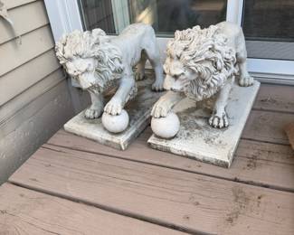 . . . two cement lions