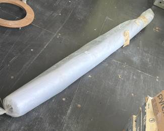 ROLL OF THIN WHITE MATERIAL