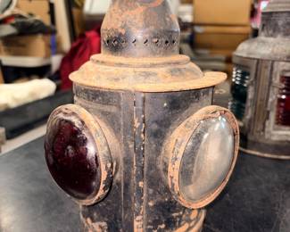 Two railroad signal lamps