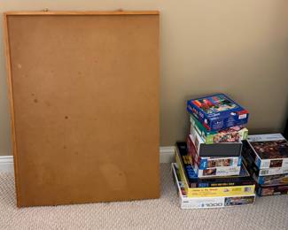 Puzzle table with puzzles