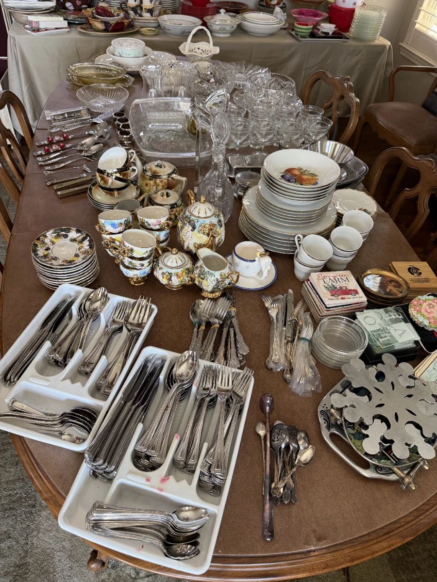 Fine china, formal silverware, crystal