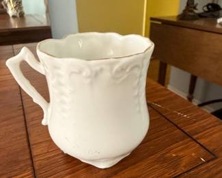 Victorian Porcelain Mustache Cup with Applied Floral Motifs and Gold Gilding