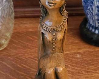 1950s-1960s Authentic Vintage Scandinavian Figurine of a Stylized Young Traveling Girl. Made from weighted faux-wood are composite and terracotta. *Has the Authentic A.S.V. Studio Mark*