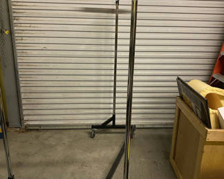 Lot 134: Rolling Clothing Rack, Heavy, Sturdy, as used by retail stores.
