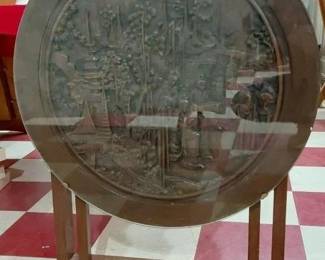 Chinoaserie heavily carved wooden flip top / glass top table