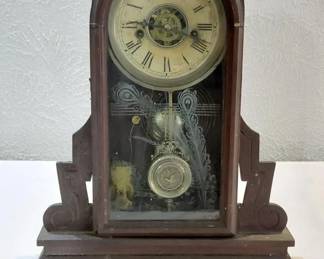 Waterbury antique clock runs and chimes great