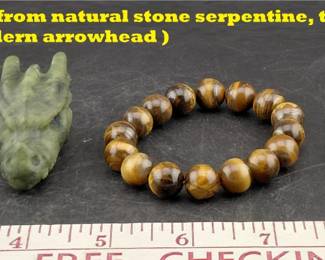 3 serpentine stone carvings, tiger eye stone bracelet, obsidian arrowhead
