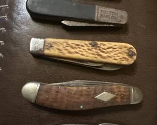 pocket knife collection in this auction also a store display case for pocket knives