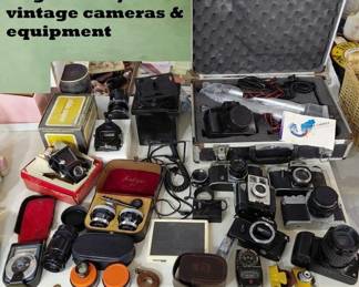 Huge dealer lots of vintage cameras and equipment in this auction