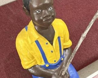 Black americana concrete statuary boy fishing