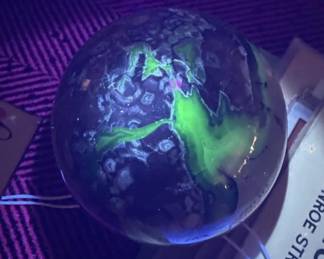 Large volcanic agate stone marble, glows green w black light likely uranium content