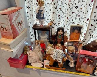 large collection of dolls