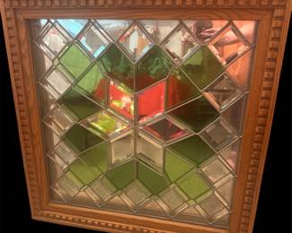 Large stained glass..colors are green and clear