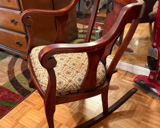 Empire-style wood rocking armchair