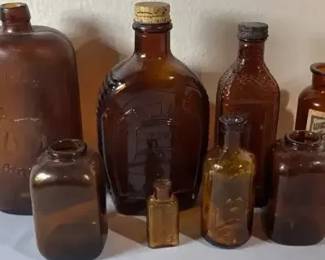 Assorted Amber Glass Advertising & Medicine Bottles – 8 Pieces