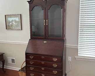 Secretary approximately 34 1/2 inches wide at the widest part 84 inches high in the tallest part and 19 inches deep at the deepest part Lights up inside on the top half