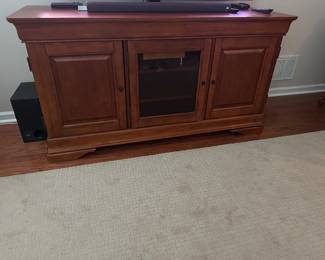 Entertainment center is approximately 5 inches long 24 inches deep 34 inches high