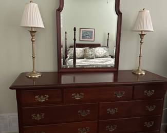 Bedroom dresser is approximately 60 inches long 36 inches high and 20 inches deep mirror is approximately 30 inches wide and 40 inches high