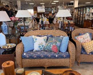 Rattan outdoor furniture set and throw pillows 