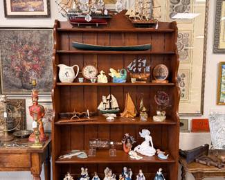 Artisan crafted wood bookcase, vintage artwork and collectibles. 