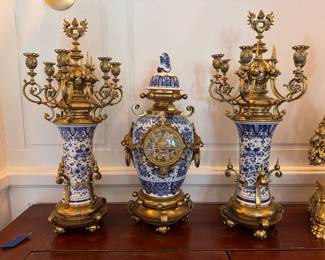 Three-Piece Delft Blue & White Porcelain & Gilt Bronze Garniture Set. Clock Measures 24" H & Candelabras Measures 28" H.  Photo 1 of 7. 