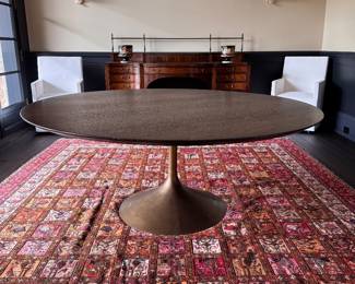 RH Aero Round Dining Table with Walnut Top and Bronze Base. Measures  72" D x 29.5" H. Photo 1 of 5. 