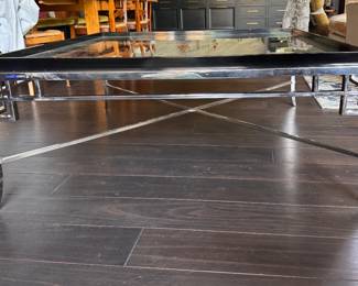 Chrome and Smoked Mirrored Glass Cocktail Table with Lacquered Ebony Raised Edge Trim. Measures 48" x 48" x 20" H. Photo 1 of 4. 