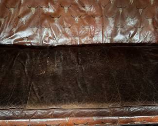 Spanish Colonial Style Leather Upholstered Sofa with Heavily Distresses Patinated Leather Seat, Turned Wood Frame with Hair on Hide Surround. Measures 80" W x 40" D. Photo 4 of  4. 