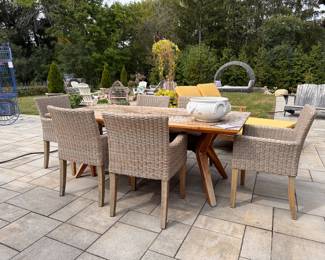 Drexel Heritage Teak Dining Table & Set of 6 All-Weather Wicker Dining Chairs. Table Measures 79” W x 39” D x 30” H. Each Chair Measures 22” W x 23” D with 19” Seat Height. Photo 2 of 3.